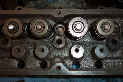 1992 Ford Bronco - This is a D8OE head that the machine shop put together to replace a cracked D8TE. Notice that the exhaust stems are smaller than the intake…