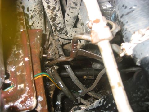 1989 Ford Bronco - On initial startup Jim hollered at me to stop since tranny fluid was goin everywhere...turned out to be a broken metal line.