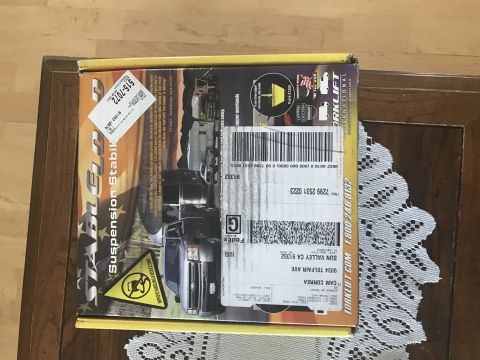 1997 Dodge 3500 - Packaging for Torklift StableLoads suspension stabilizers, images of trucks and product information.