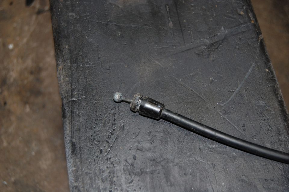 Door lock cable with ball end