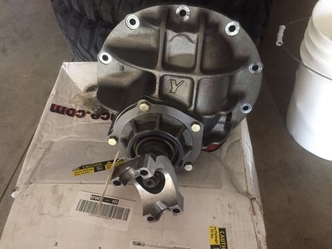 1982 Ford Bronco - A differential housing and yoke are shown, likely a replacement part for a vehicle.