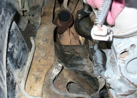 1992 Ford Bronco - Passenger side engine mount bracket got pretty beat up from wrestling the near-impossible engine into place.