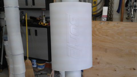 1985 Ford Bronco - Final primer coat on muffler. The lines are from my lighting