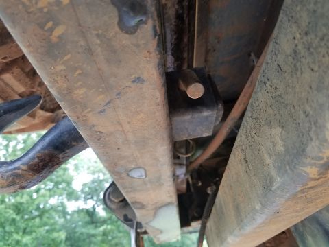 1988 Ford Bronco - Underside view of a 1988 Ford Bronco, showing the frame and suspension components.