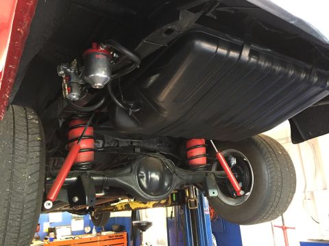 1972 Ford Ranchero - Undercarriage view of a vehicle, highlighting the fuel tank and rear suspension components.