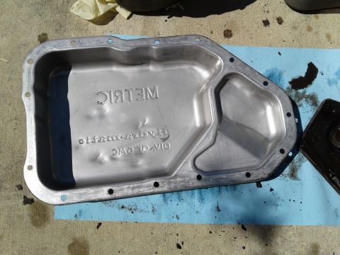 1984 Buick Electra - Transmission oil pan with "METRIC" and "TRANS-SUBARU" stamped on it.