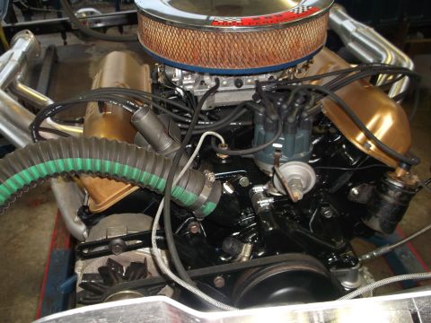 1964 Ford Galaxie - Close-up of a Ford V8 engine, likely from the 1960s, with custom headers and air cleaner.