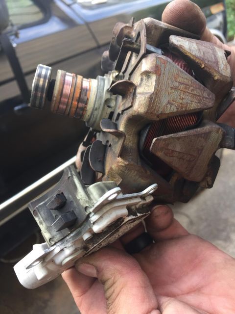 1988 Ford Bronco - This is a close-up view of a worn automotive alternator part.
