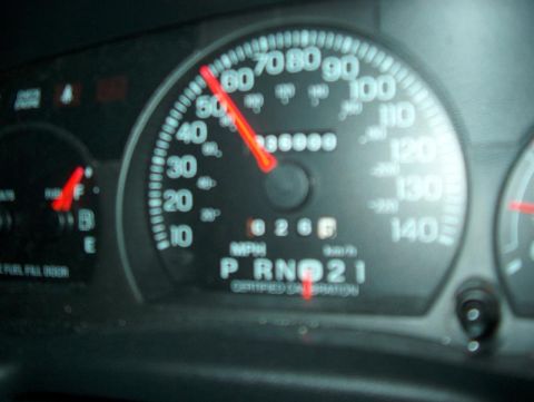 2001 Ford Crown Victoria - Close-up of a vehicle's dashboard gauges, including the speedometer and odometer.