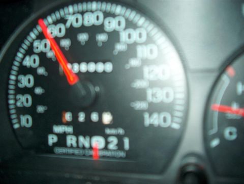 2001 Ford Crown Victoria - Dashboard gauges display speed and mileage, with the odometer reading 36,000 miles.