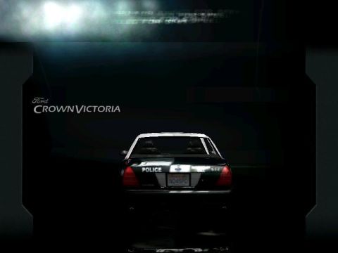 2001 Ford Crown Victoria - This Ford Crown Victoria is marked as a police vehicle, with 'POLICE' visible on the trunk.