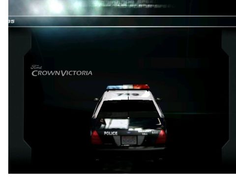 2001 Ford Crown Victoria - Police car with light bar and "POLICE" text on the rear.