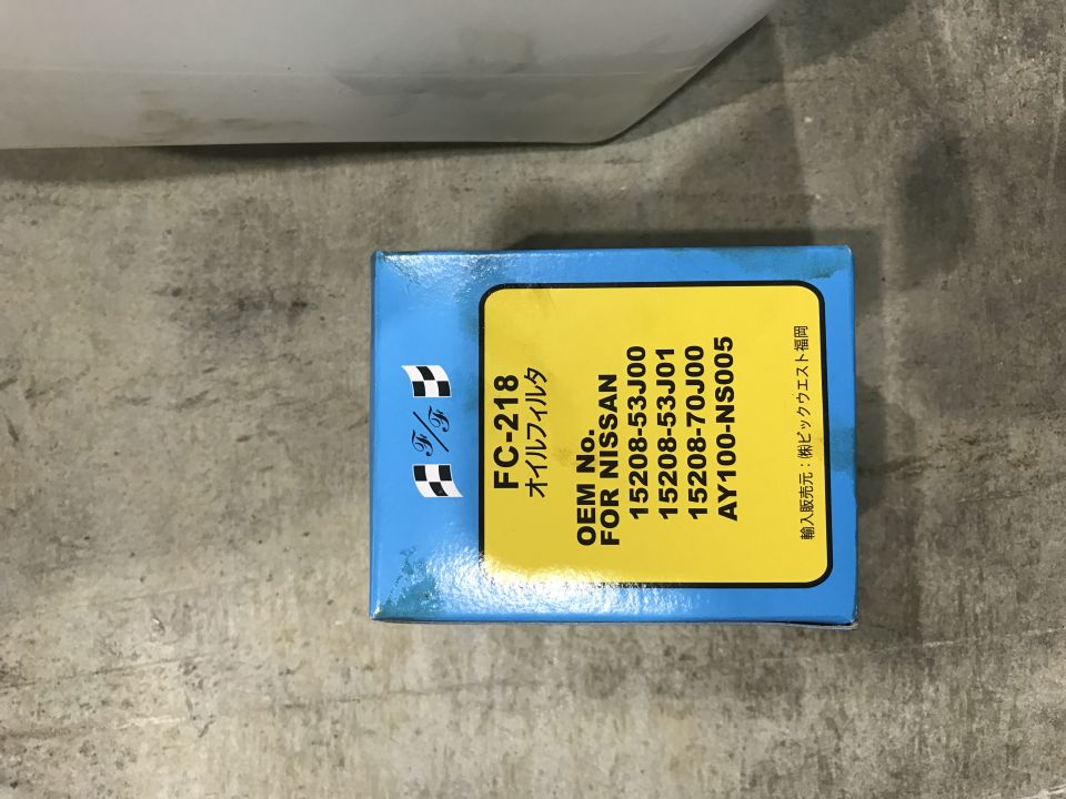 Box for Nissan oil filter FC-218 with part numbers and Japanese text.