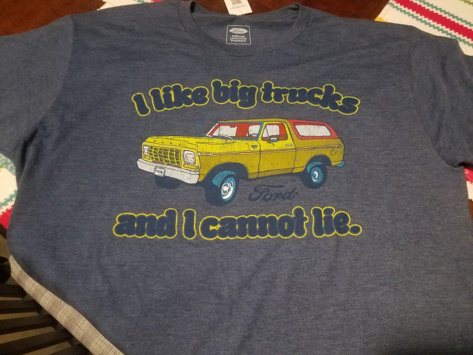 T-shirt with yellow 1978 Ford Bronco graphic and text.
