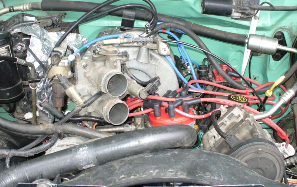 Engine installed and mostly buttoned up.  Just need to finish some exhaust and wiring stuff, and get the new radiator in.