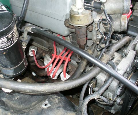 1992 Ford Bronco - So much room without the vacuum canisters! Shorty headers installed, spark plug wires tidied up and protected with sleeves.