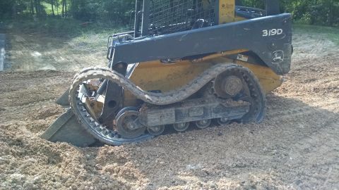 2004 Land Rover Land Rover - After a couple of hours spreading gravel, the track broke. It took the rental company a couple more hours to bring a replacement, which the…