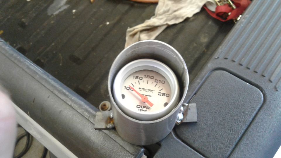 Pro-Comp Ultra-Lite differential temperature gauge in a silver housing.