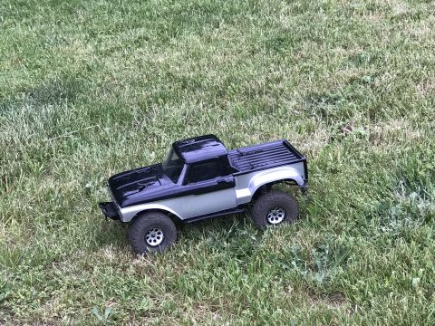 1989 Ford Bronco - This remote control truck features a two-tone paint scheme and off-road tires.