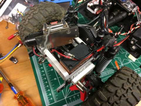 1989 Ford Bronco - Close-up of an RC car's chassis, showing the winch and suspension components.