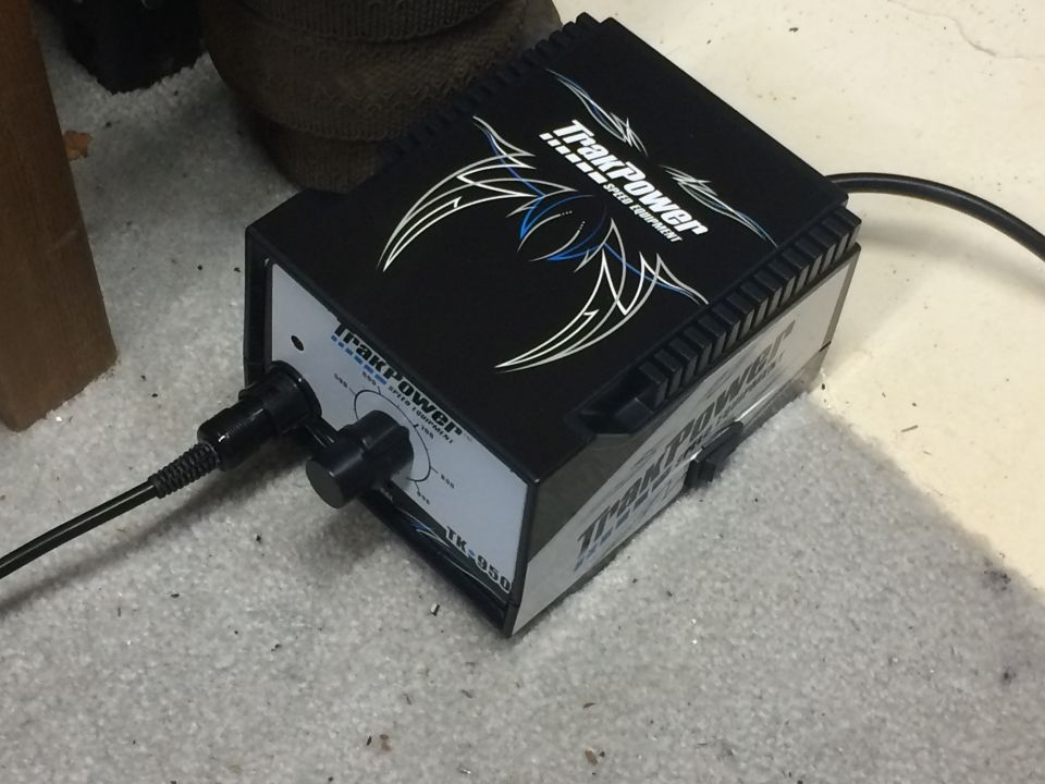 TrakPower TK-950 battery charger with two connectors plugged in