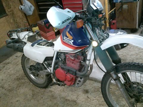 1987 Honda XL600R - Here it is on a Monday night...after mounting the bark busters. Thought it would be a good time to install the rest of the parts.