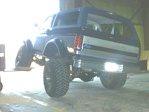 1995 Ford Bronco - This Ford Bronco, likely from the early 1980s, is modified with a lifted suspension and off-road tires.