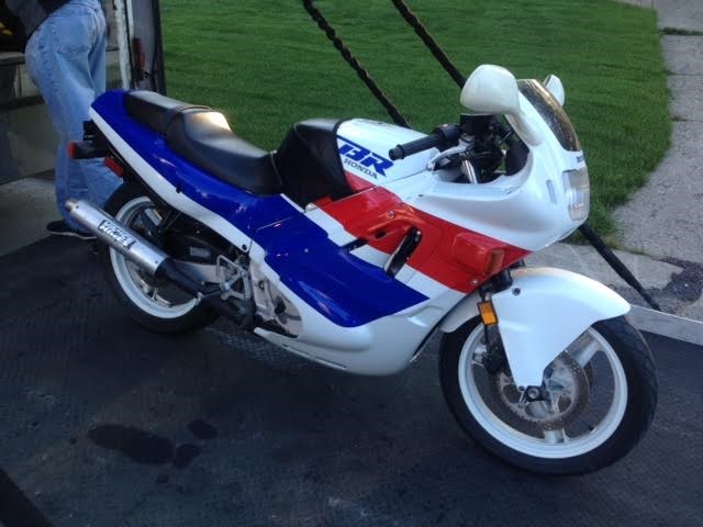 1989 Honda CBR600F motorcycle, side view, white, blue, and red