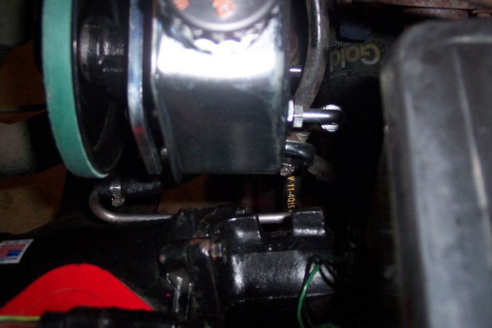 Power steering pump with green belt and hoses