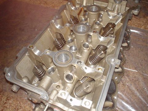 1999 Ford Taurus - SVT heads being dissasembled. The Rocker arms and cams are removed.