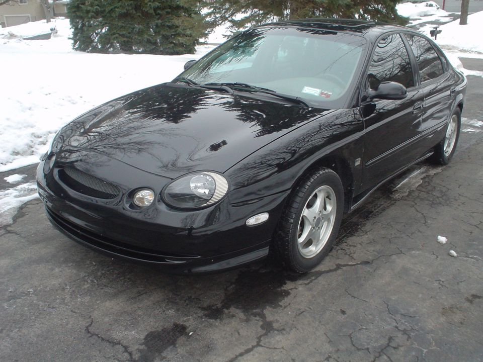 My car in the winter with clear corners.