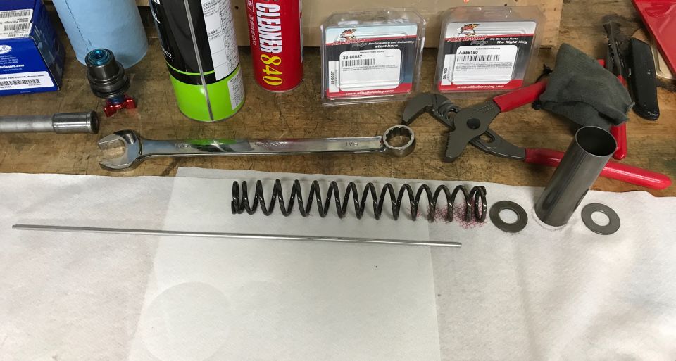 1998 ZX9R fork leg disassembly, fork rod, spring, spacer, and washers removed
