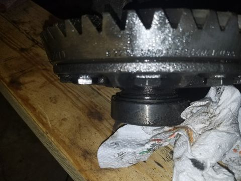 1996 Ford Bronco - Close-up view of a differential gear assembly with surrounding wooden components.