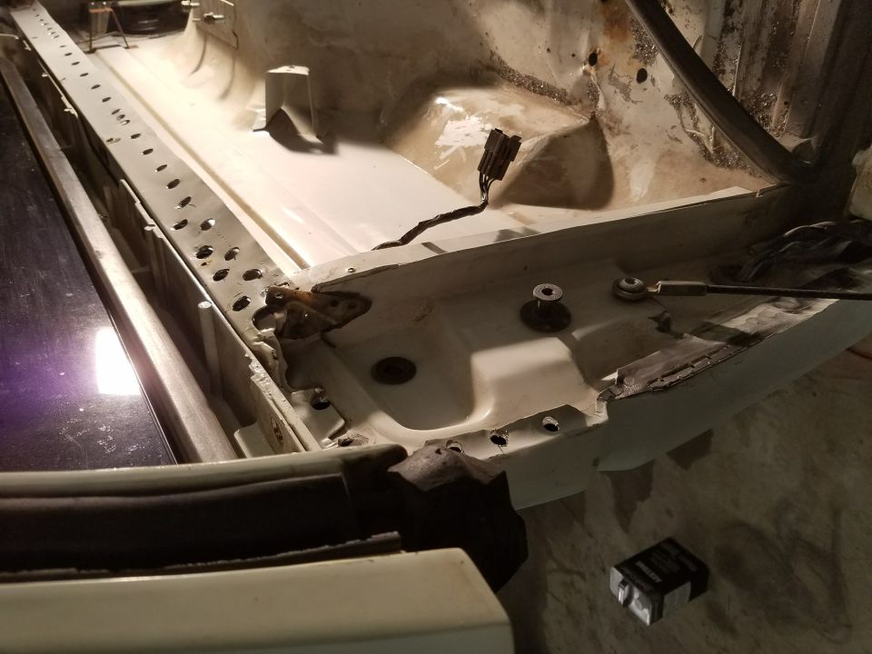 Interior vehicle body, rocker panel area, exposed metal, wiring, structural components, holes, rust