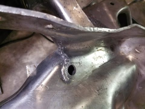 1996 Ford Bronco - This image shows a close-up of a metal part, not a complete vehicle.