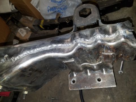 1996 Ford Bronco - A close-up view of a welded metal frame component, possibly from a vehicle's chassis.