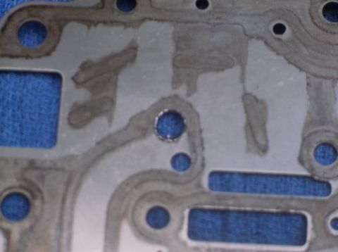 1979 Ford Ranchero - Engine gasket detail with visible openings showing blue material underneath.