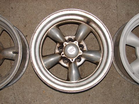1973 Ford Ranchero - Set of three aluminum alloy wheels, one an American Racing center cap.