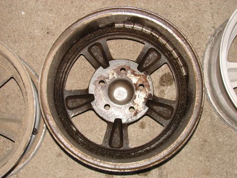 1973 Ford Ranchero - Close-up of a single aftermarket alloy wheel, showing wear and tear.