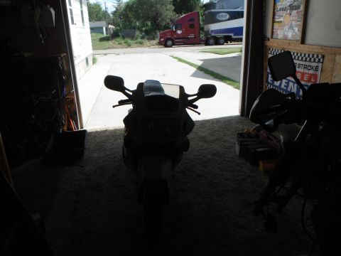 1989 Honda CBR600F - Rode to the garage to adjust tire pressure and double check fluids. Should have checked lighting for photo. Stable mate is also a Honda...a…