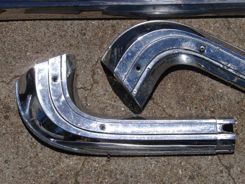 1973 Ford Ranchero - These chrome trim pieces appear to be parts from a vehicle, possibly for restoration.
