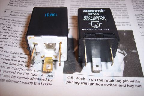 1993 Toyota Pickup/SR5 - Two automotive relays are shown against a background of text and diagrams from a manual.