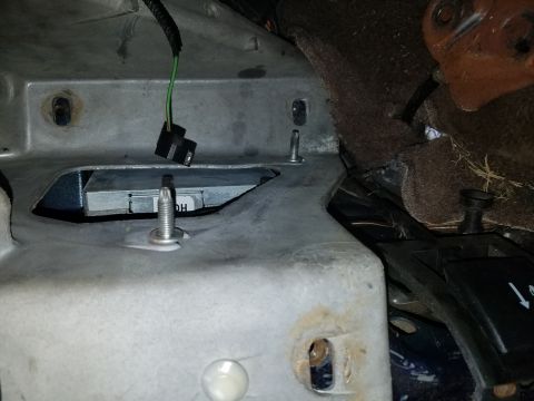 1994 Ford Bronco - Interior view of vehicle metal structure with visible wiring and component markings.