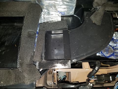 1994 Ford Bronco - Close-up of car interior showing insulation and ducting, not a 1994 Ford Bronco.