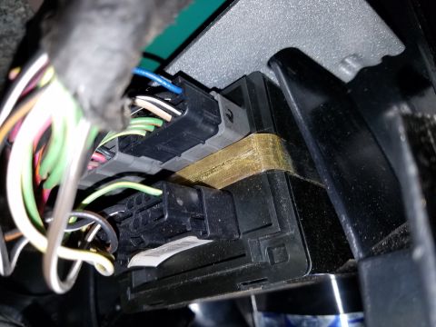 1994 Ford Bronco - Vehicle wiring harness connectors are visible, with multiple wires leading into black and gray plastic housings.