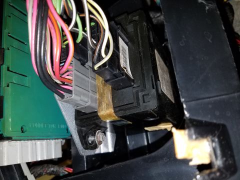 1994 Ford Bronco - Vehicle interior shows a complex wiring harness connected to electronic modules and fuse box components.