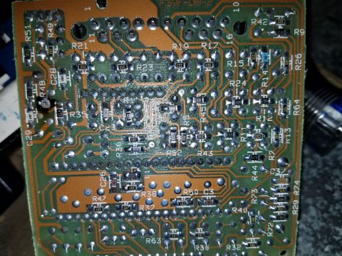 1994 Ford Bronco - This is a close-up view of an electronic circuit board, likely a component from a vehicle's dashboard or control system.