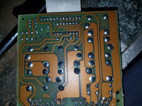 1994 Ford Bronco - This circuit board has a Ford logo, suggesting it's a vehicle part, but its specific year and model are not identifiable from the image.