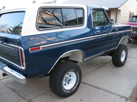 1978 Ford Bronco - This 1978 Ford Bronco features a two-tone blue and white paint scheme with chrome accents.