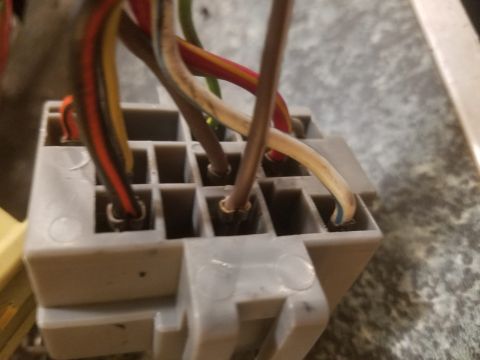 1994 Ford Bronco - Photograph of an automotive multi-pin connector with color-coded wires, not a technical document.